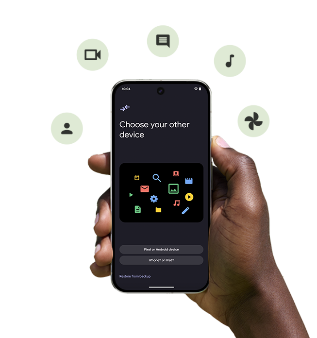 A close-up of a person's hand holding a Pixel phone with app icons floating around the phone